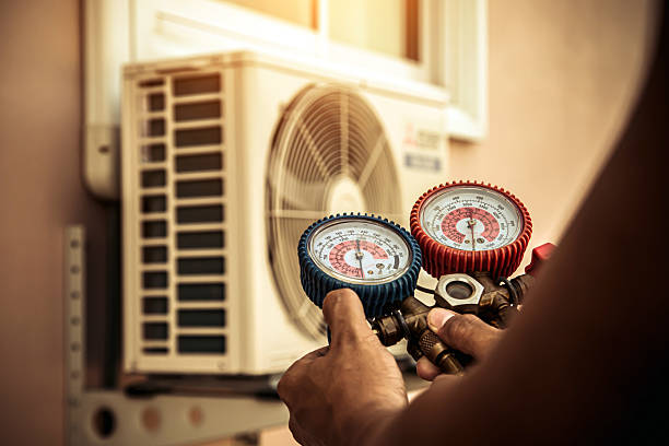 Professional Hvac technician working in Randolph, MA